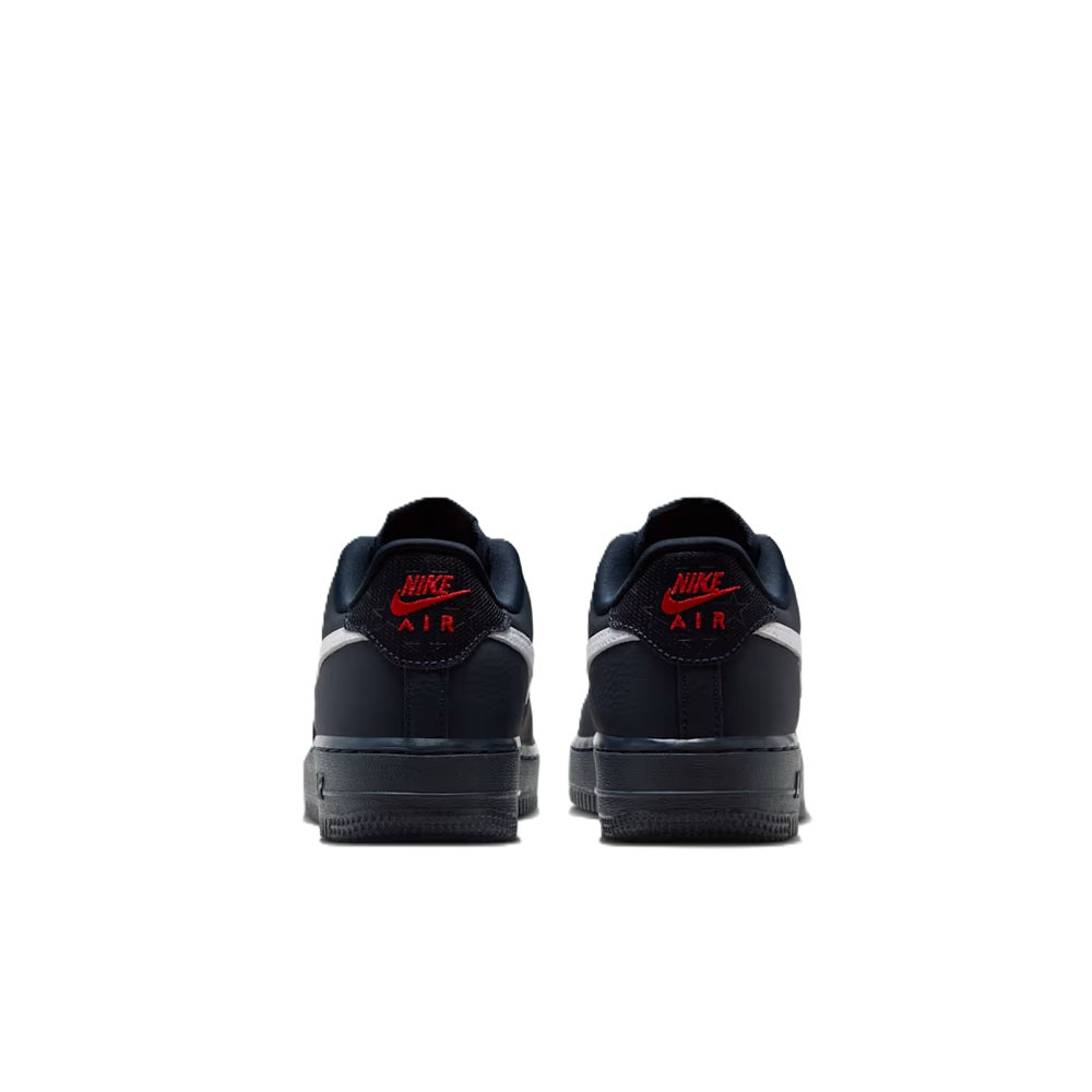 Nike Air Force 1 low sneakers, back view with dark heel and red AIR branding.