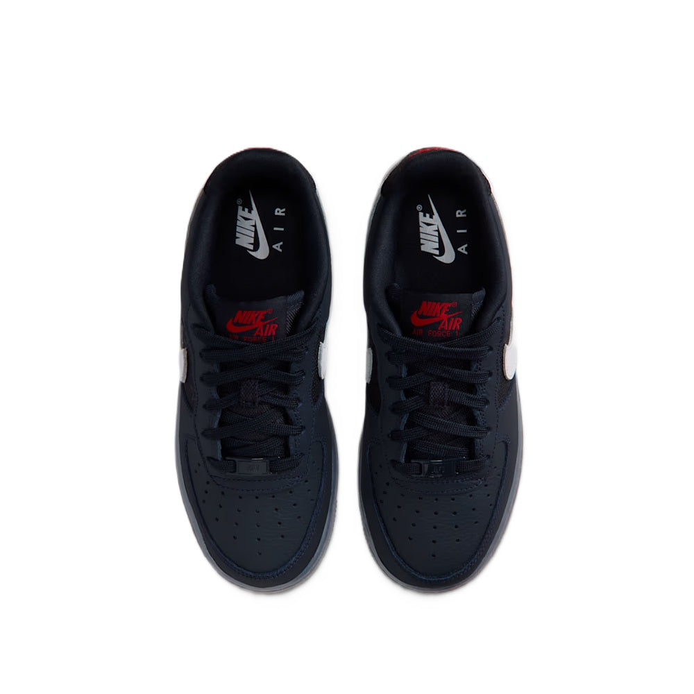Nike Air Force 1 low sneakers, top view of insoles with AIR text and red swoosh.
