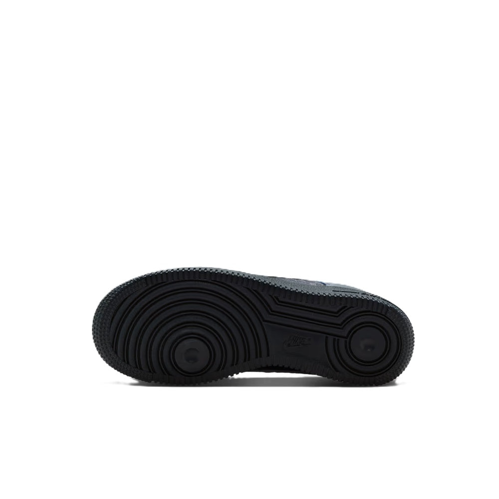 Nike Air Force 1 outsole in dark navy/black with textured traction pattern.