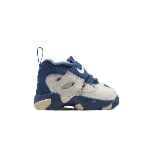 Toddler Nike Air Diamond Turf sneakers in navy and sail with blue Swoosh and beige sole