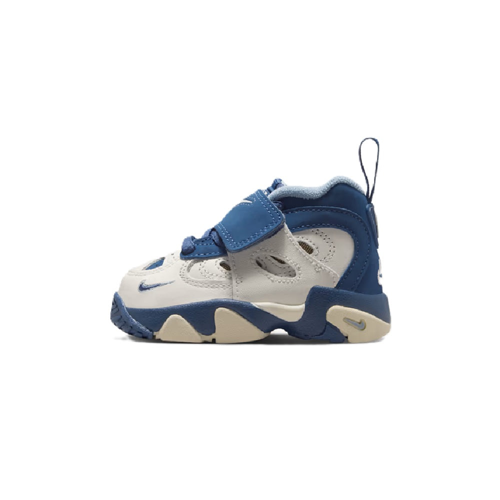 Toddler Nike Air Diamond Turf sneakers, blue hook strap, sail upper, and navy Swoosh