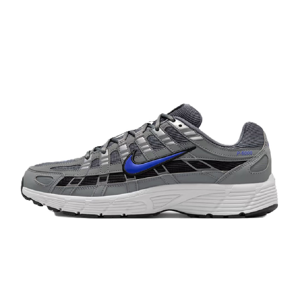 Men's Nike P-6000 running shoe, smoke gray upper with Racer Blue swoosh, side view.