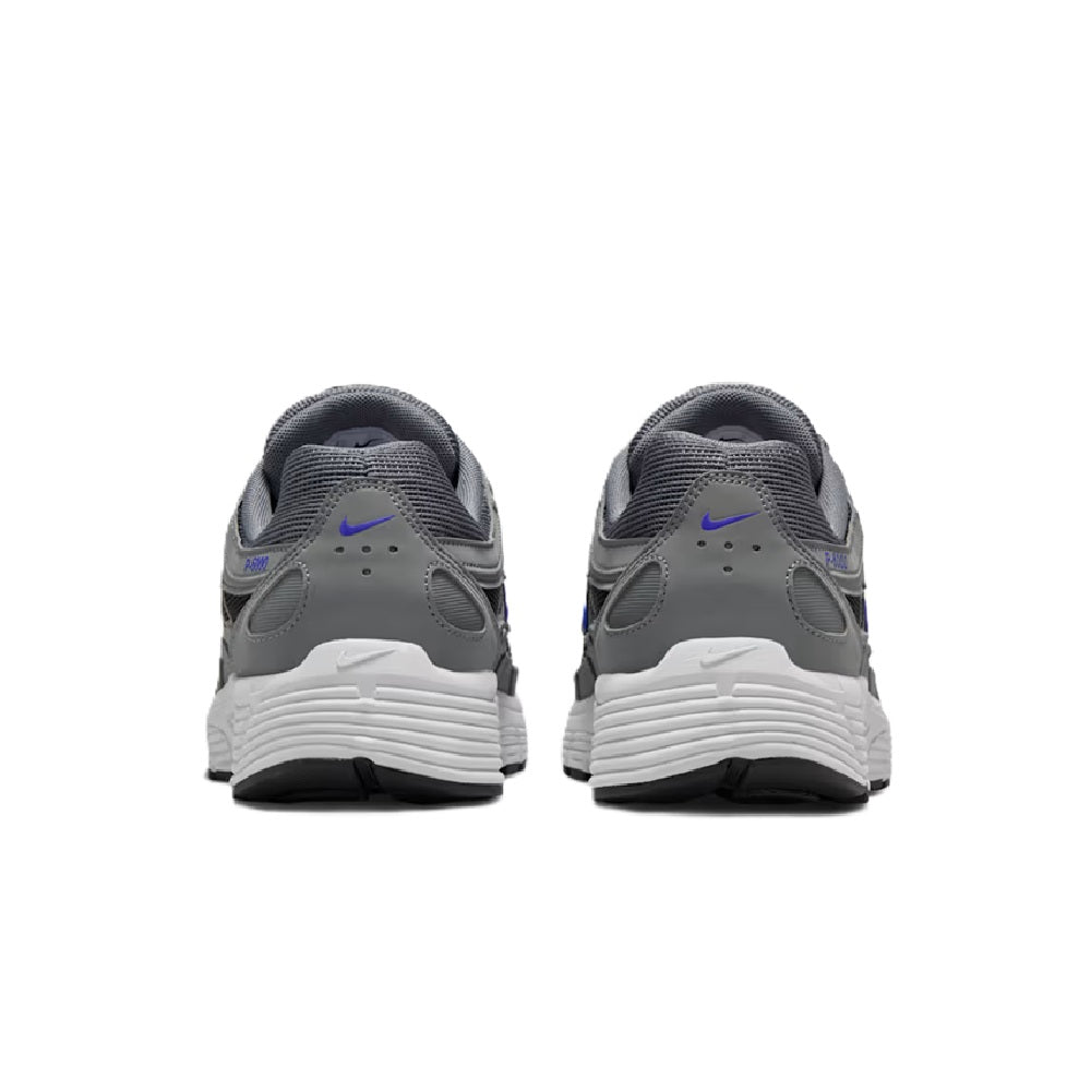 Back view of Men's Nike P-6000 shoes, smoke gray mesh with white midsole and blue hits.