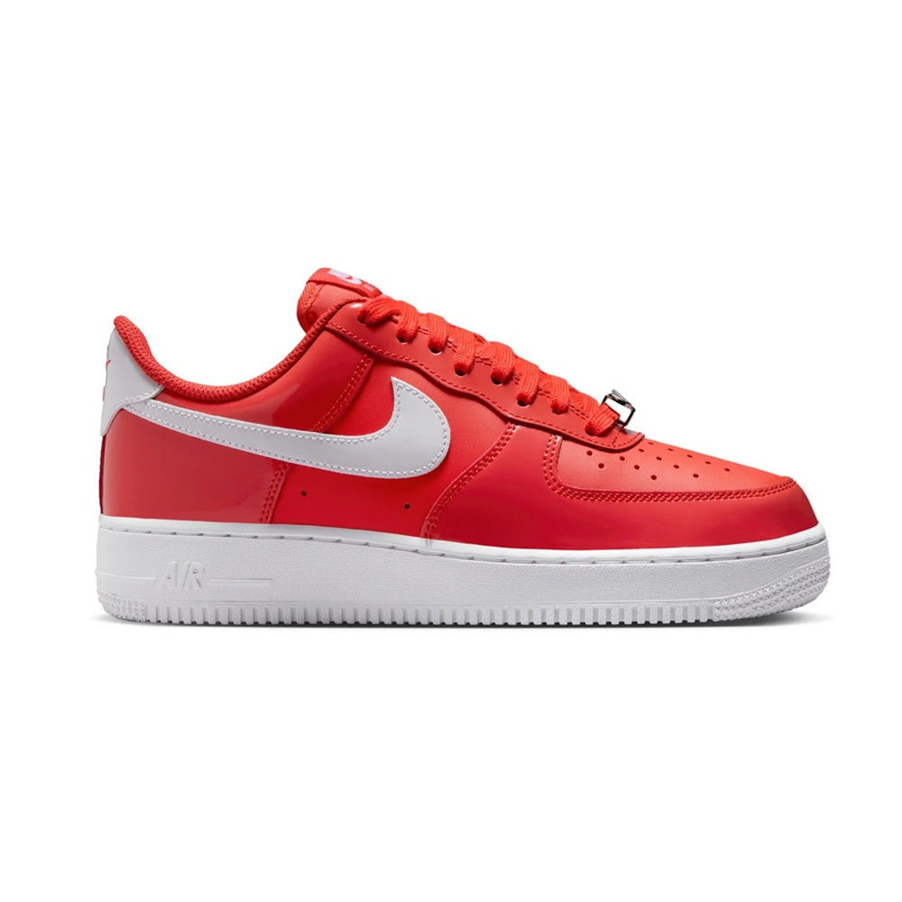 Nike Air Force 1 low-top sneakers in light crimson and white, side view