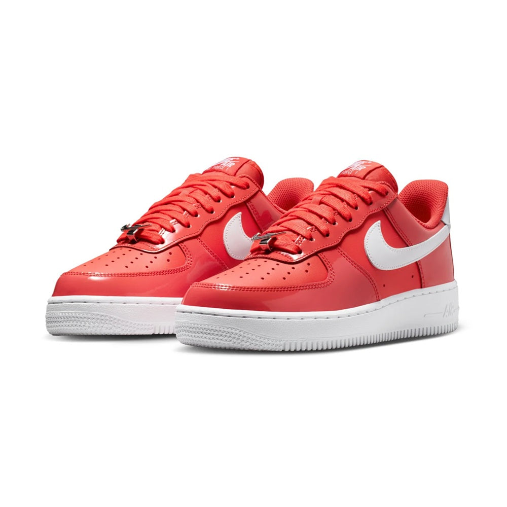 Nike Air Force 1 low-top sneakers, pair front view with crimson laces and white panels