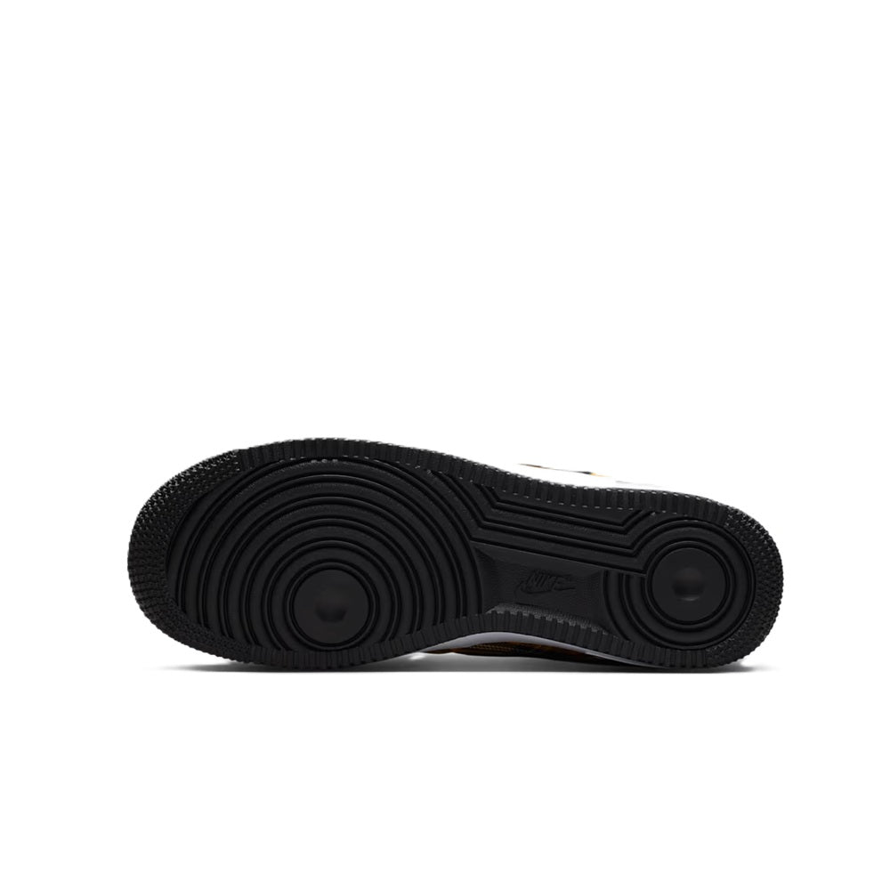 Nike Air Force 1 outsole view with textured rubber tread and circular traction pads