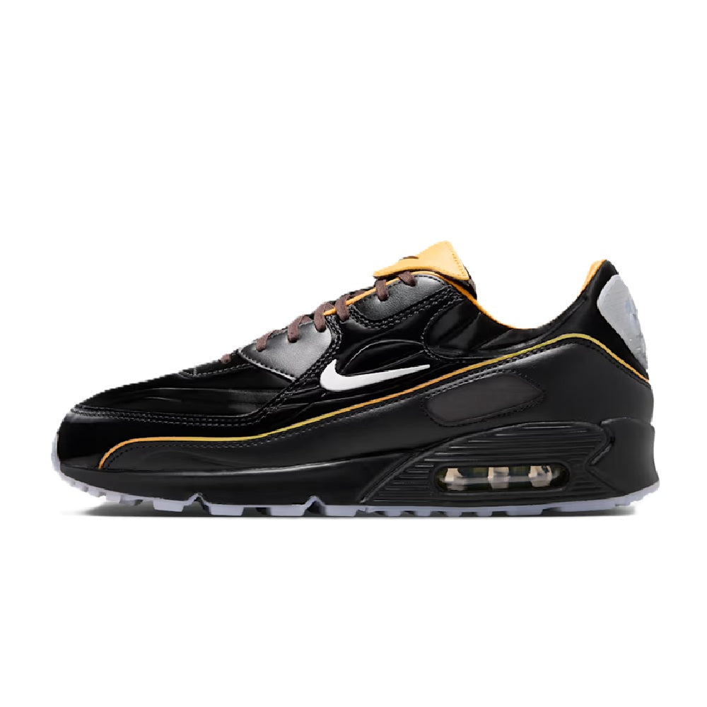 Nike Air Max 90 SE black sneaker with gold outline, white swoosh, air window
