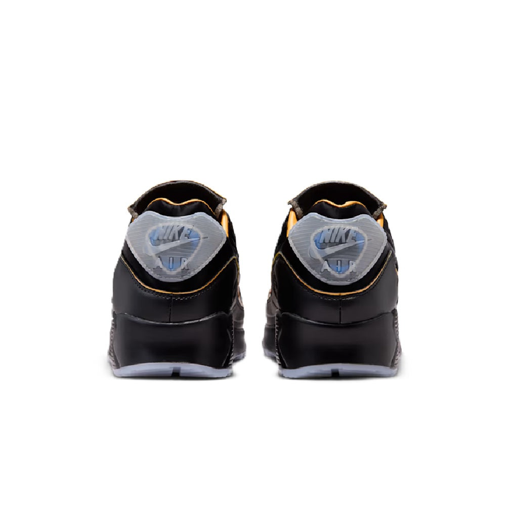 Nike Air Max 90 SE black heel pair with 'AIR' logo and gold-edged collar