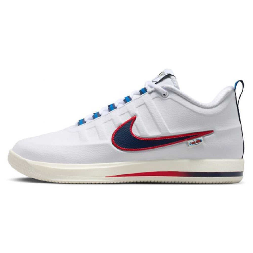 White low-top sneakers with navy and red Nike swoosh, blue accents, and cream sole