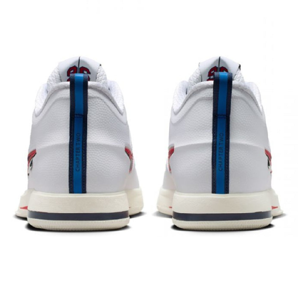 Back view of white low-top sneakers with navy heel strap detail and cream outsole