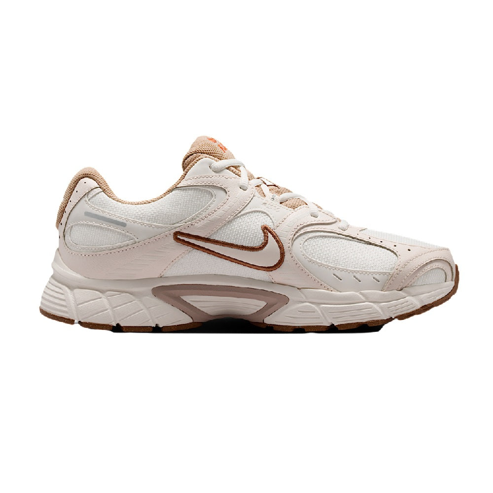 Men's Nike running sneaker, side view, light ivory upper with brown swoosh and laces.