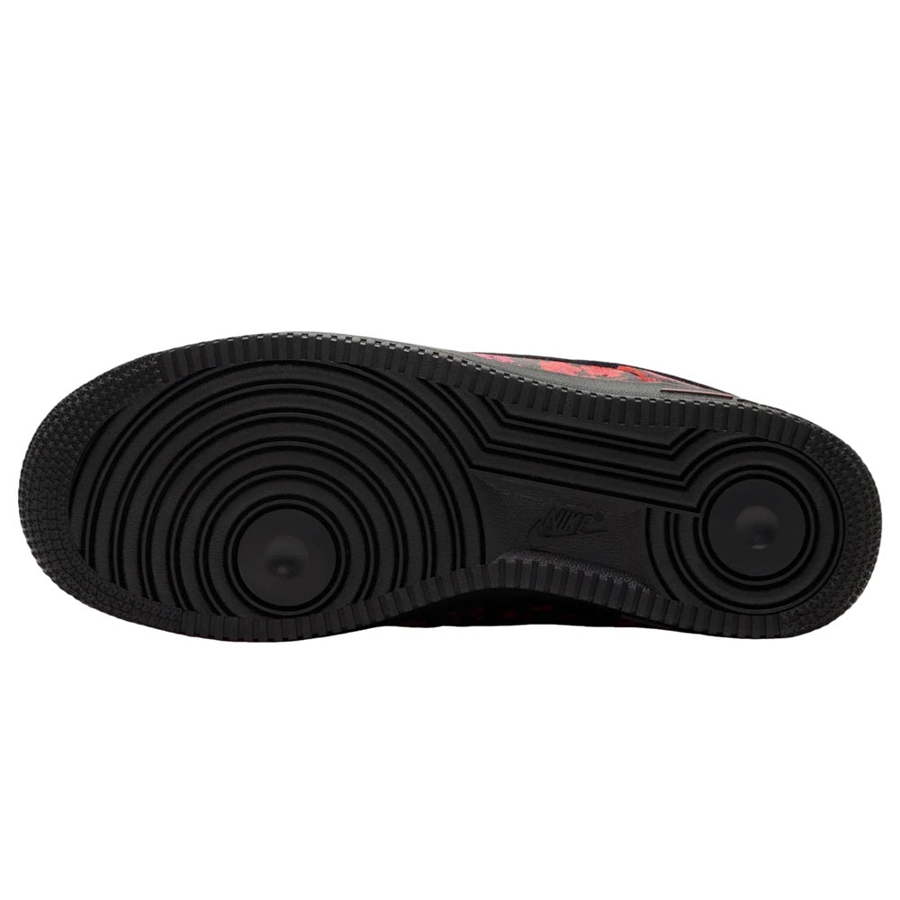 Nike Air Force 1 rubber outsole with circular tread pattern and black traction grooves