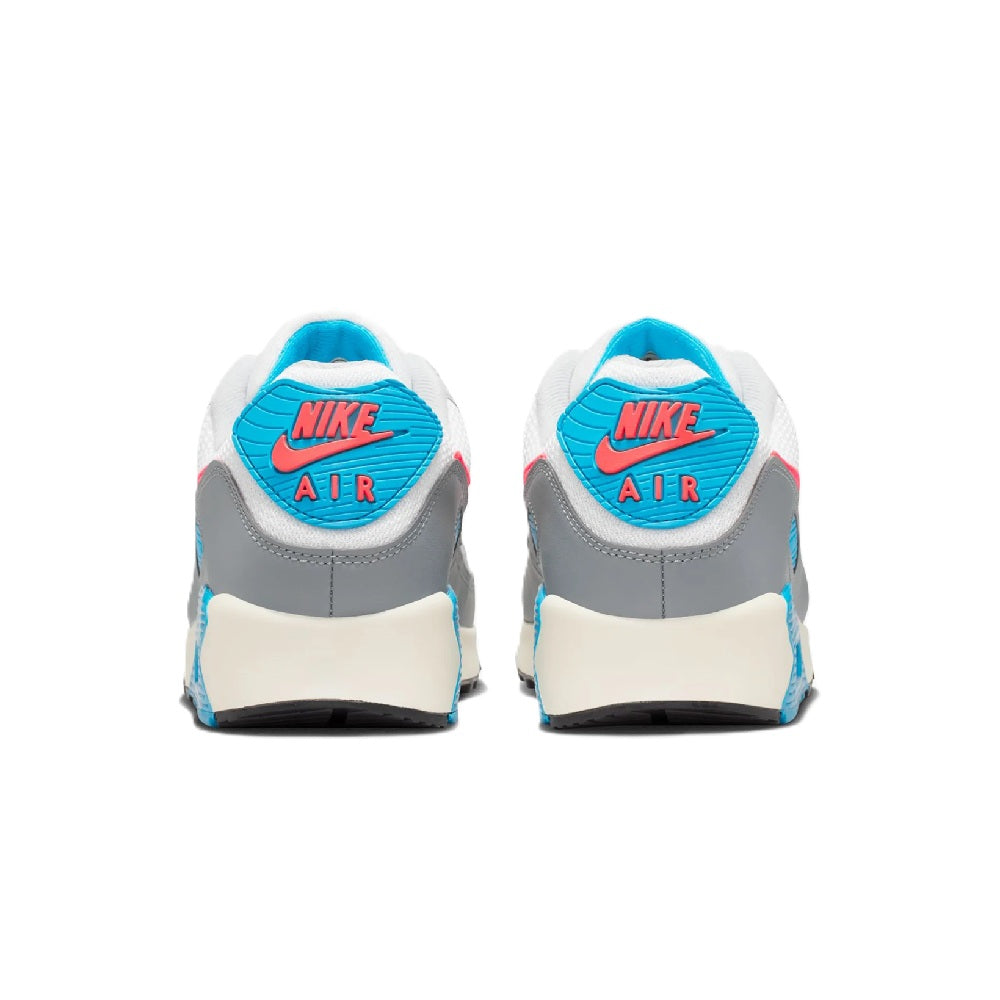 Heel view of grey sneakers with blue collar and Nike Air branding at the back