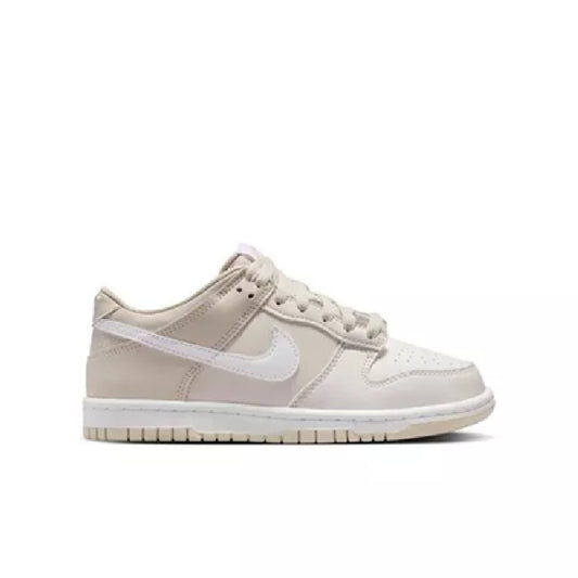 Kids' low-top sneakers with white leather and light beige overlays, lace-up