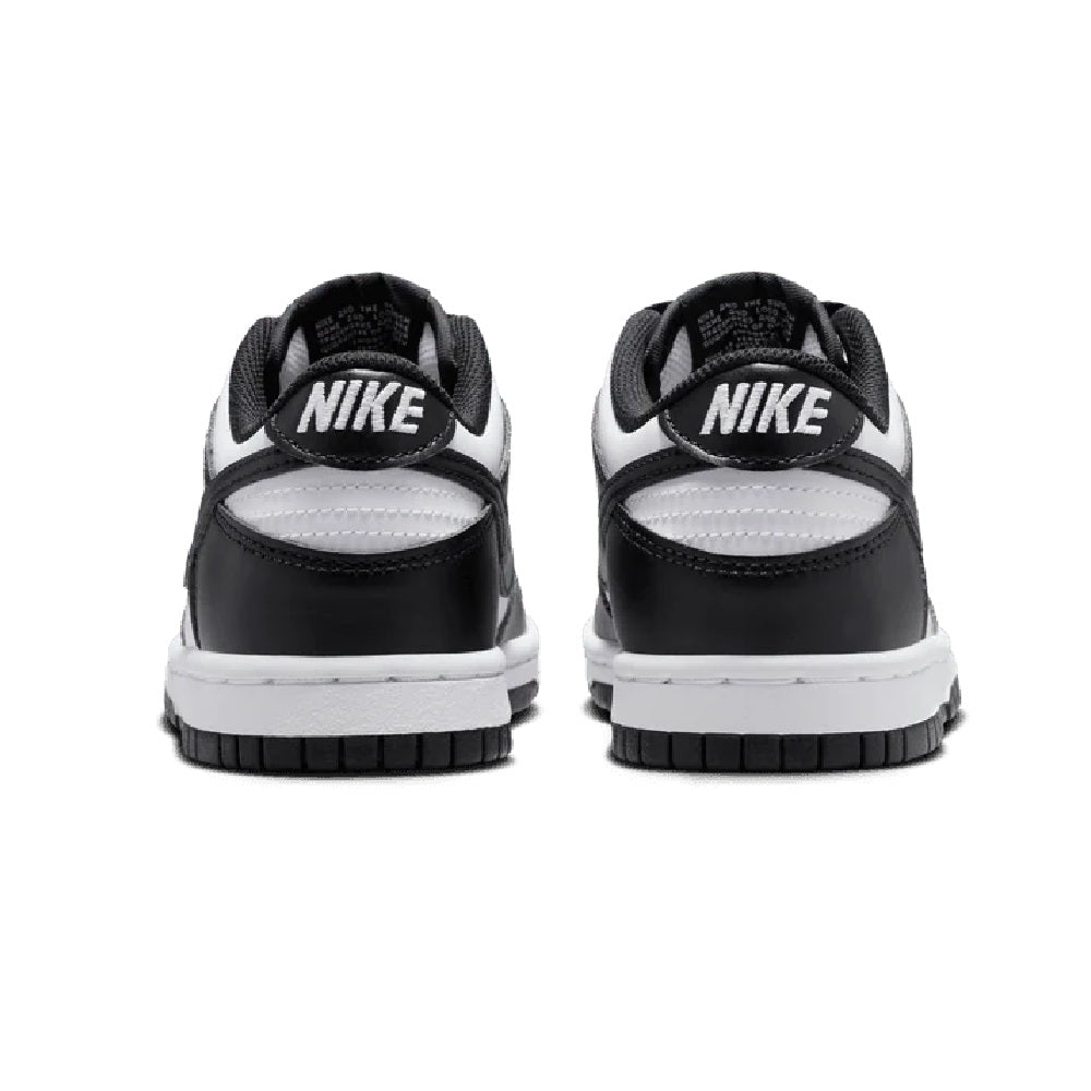 Kids' Nike Dunk Low sneakers, black and white back view with NIKE heel branding