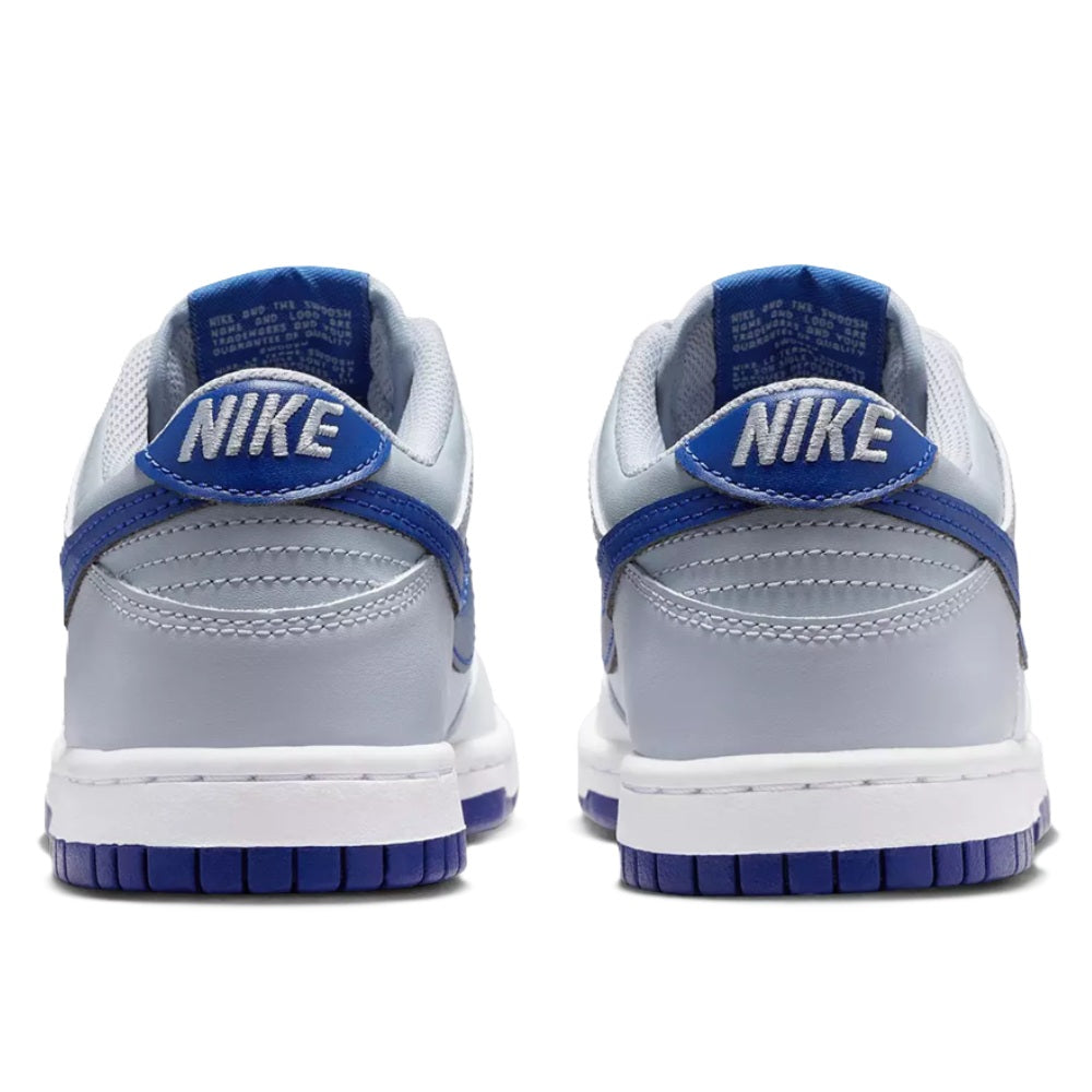 Kids Nike Dunk Low sneakers with blue heel tab and white rear panels