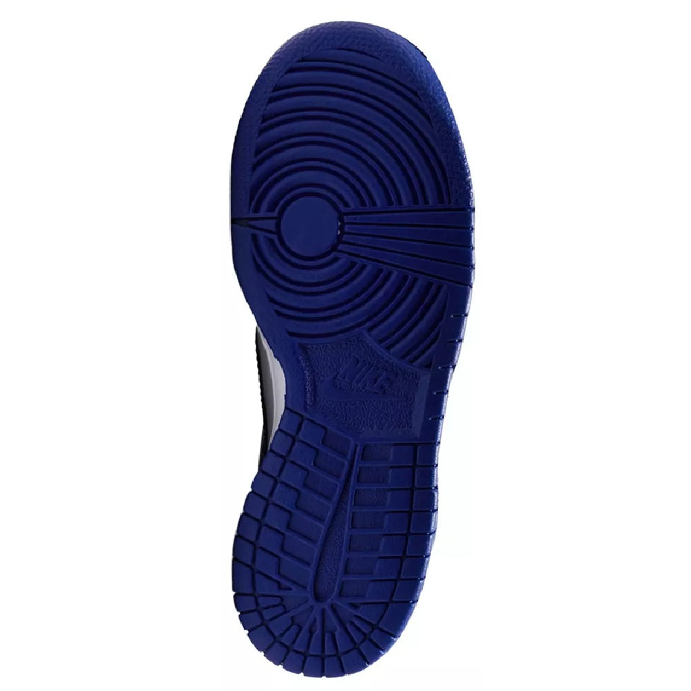 Kids Nike Dunk Low outsole, dark blue rubber tread with circular traction pattern