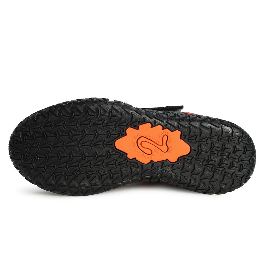 Kids Nike Ja 3 outsole view, black tread with orange logo accent on zebra shoe