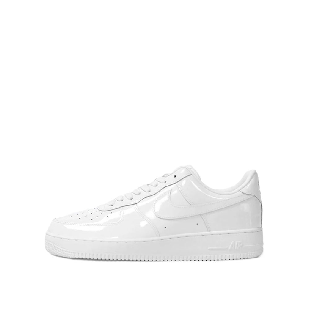 White Nike Air Force 1 PRM sneakers, lace-up with swoosh and perforated toe