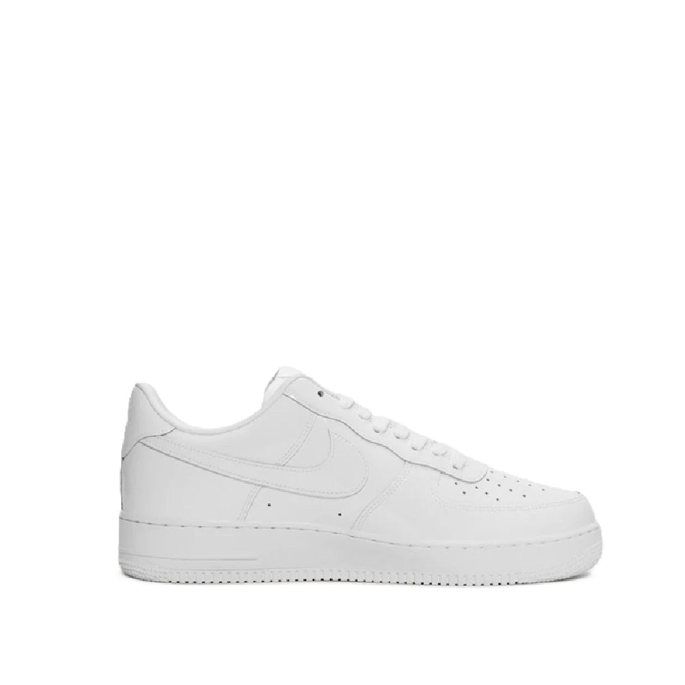 White Nike Air Force 1 PRM sneakers, side profile with swoosh and lace-up