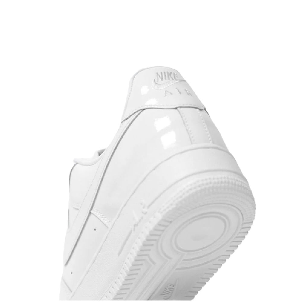 White Nike Air Force 1 PRM sneaker close-up of heel and side with swoosh