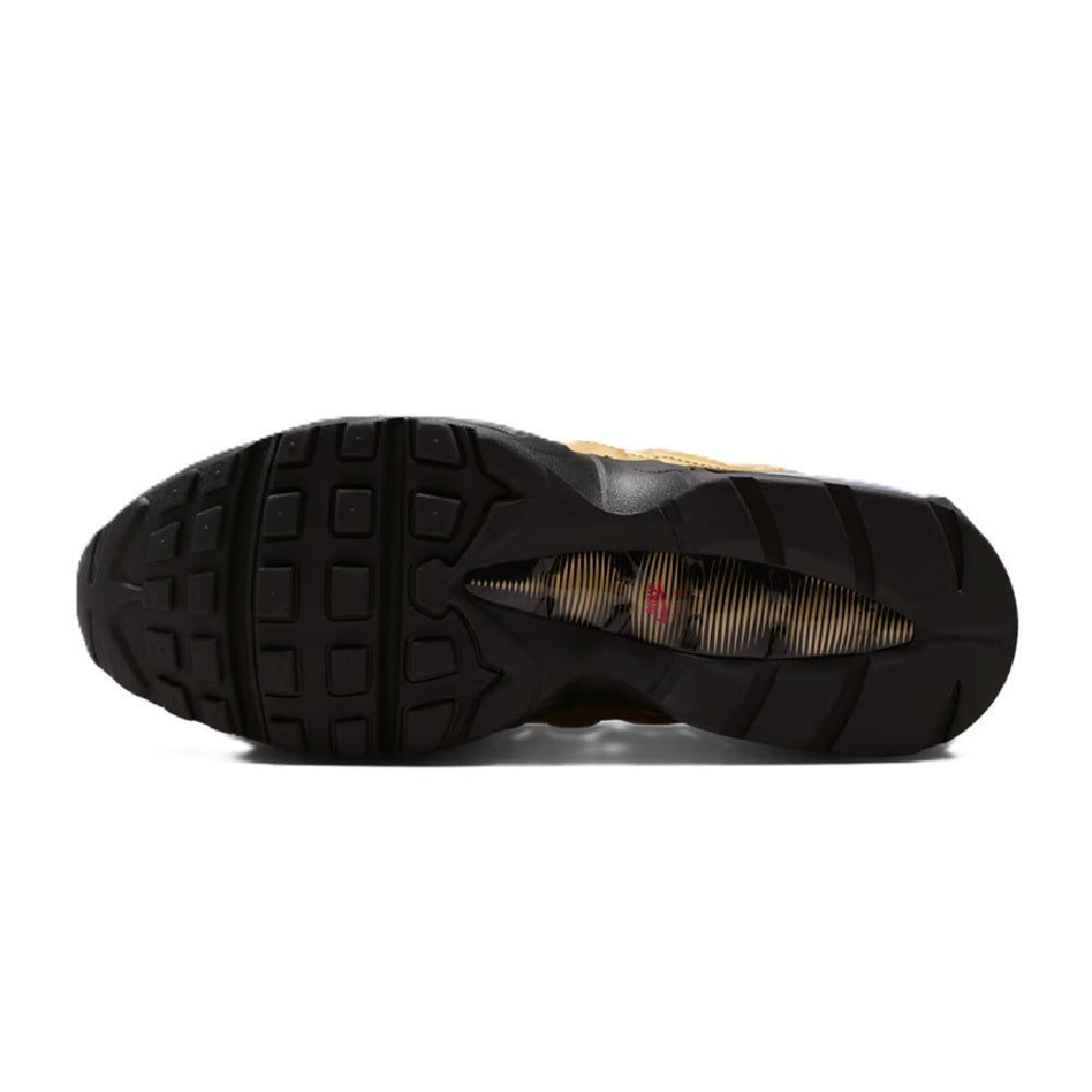 Nike Air Max 95 outsole with textured black tread and gold-toned inner detail