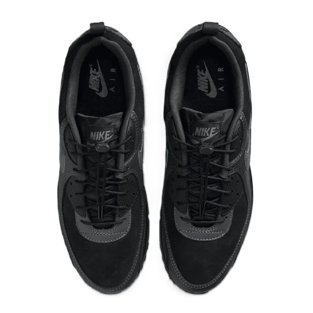 Black Nike Air Max 90 sneakers with lace-up closure and Nike branding on tongue