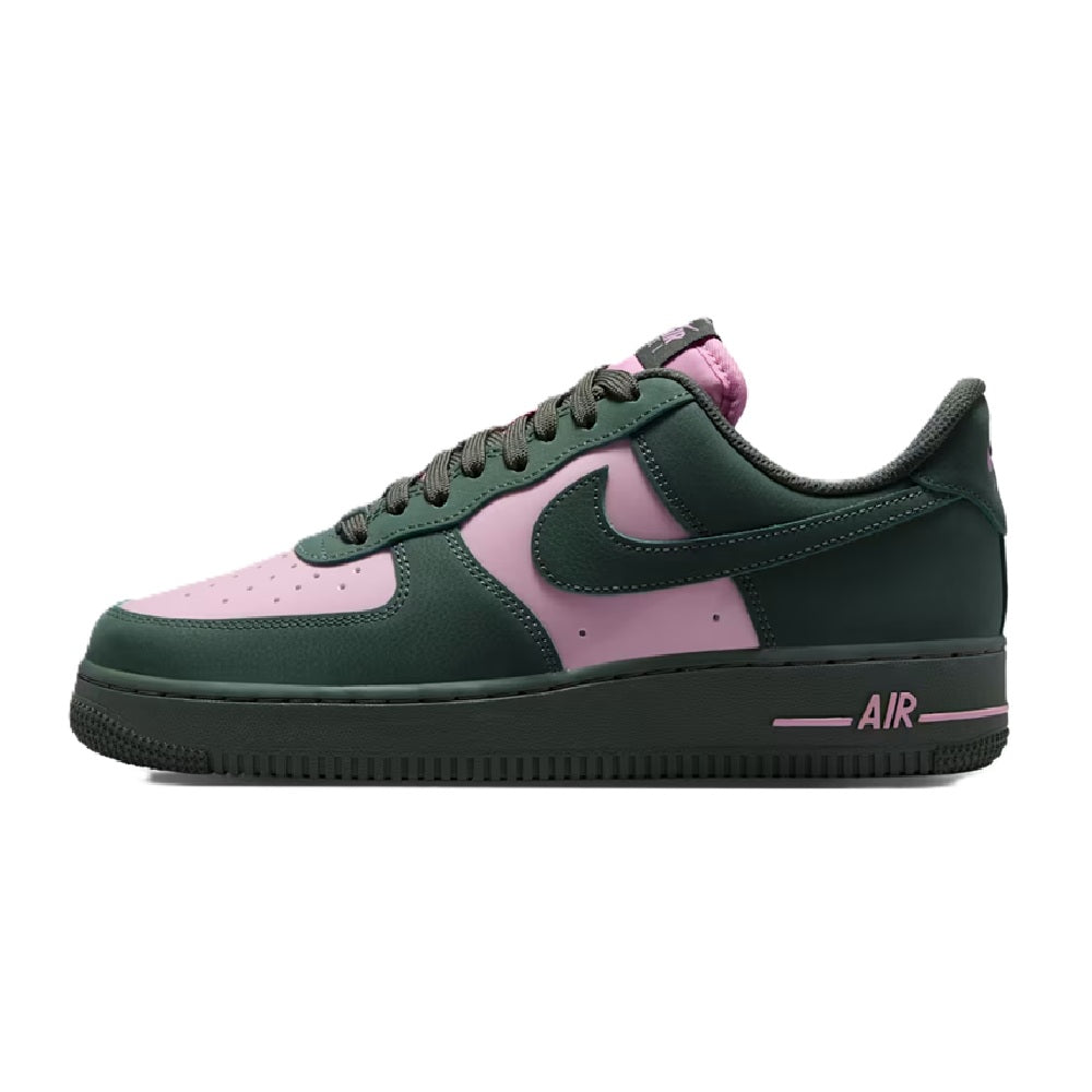 Green low-top sneakers with pink side panels, lace-up, and Air detail