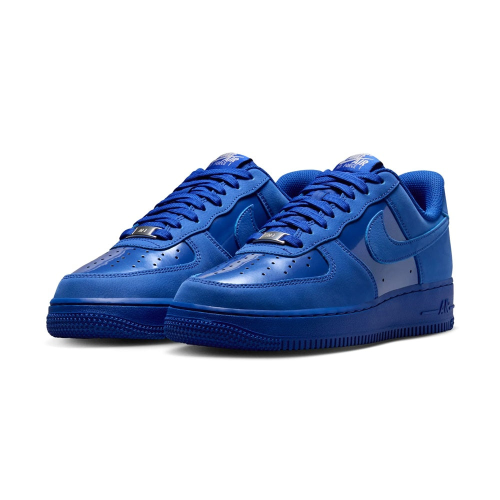 Pair of women's Nike Air Force 1 low sneakers, royal blue lace-up eyelets