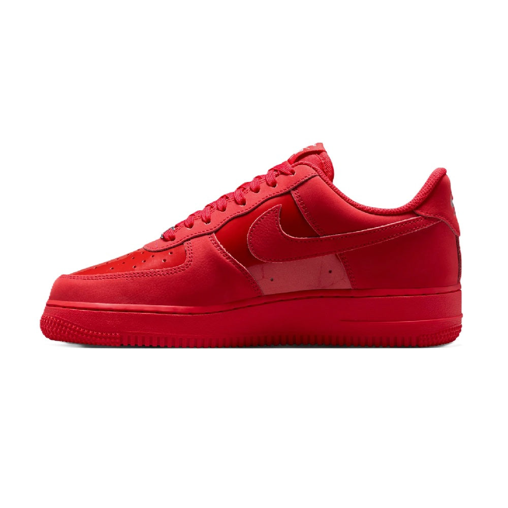 Red Nike Air Force 1 low-top sneakers, side view with swoosh and perforated toe