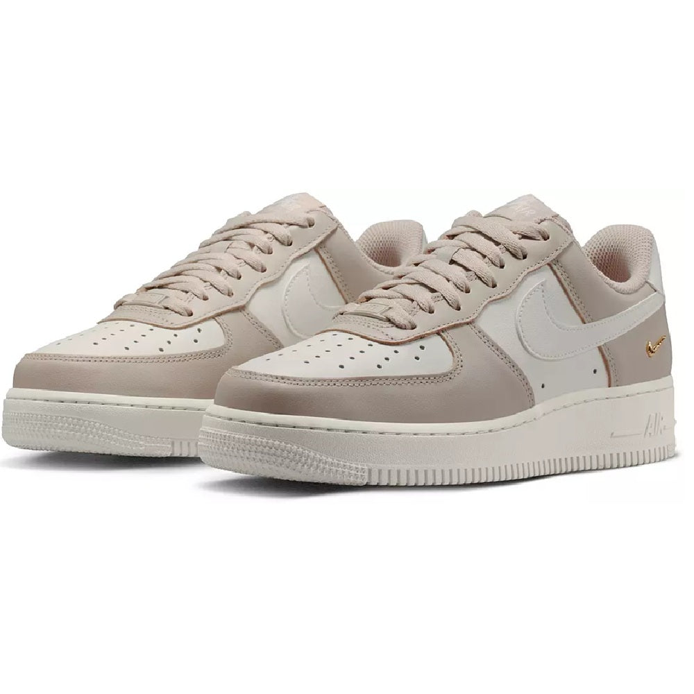Nike Air Force 1 low sneakers, cream and taupe tones, lace-up, visible wing logo