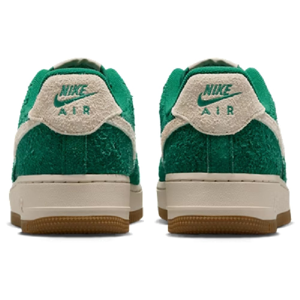 Nike Air Force 1 low-top sneakers, green suede heels with cream NIKE AIR logo and gum outsole