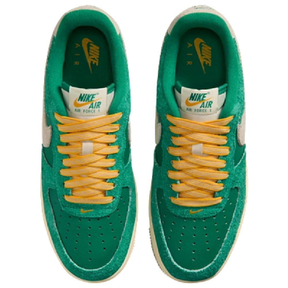 Nike Air Force 1 low-top sneakers, green suede with orange lace up and Nike Air interior label
