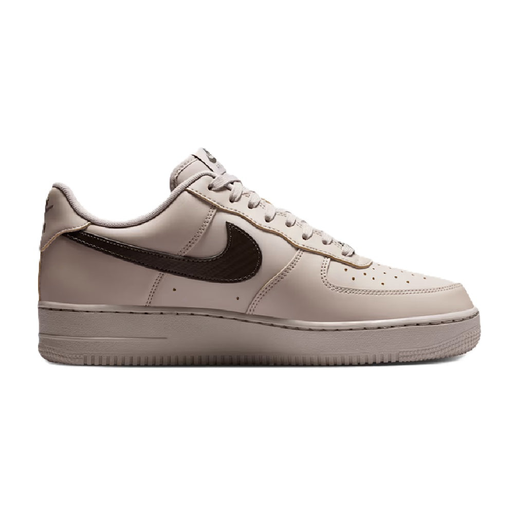 Nike Air Force 1 low-top sneakers in light gray with dark swoosh detail