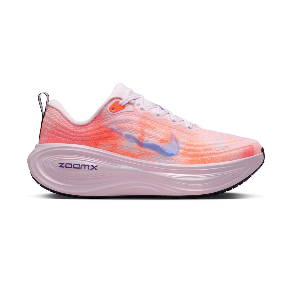 Women's Nike Vomero Plus running shoe in lilac and orange with visible ZoomX midsole.