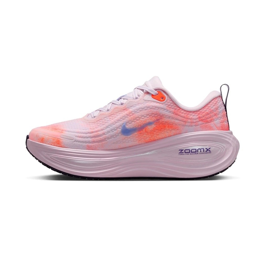 Women's Nike Vomero Plus running shoe, side view, lilac-orange upper with blue swoosh.