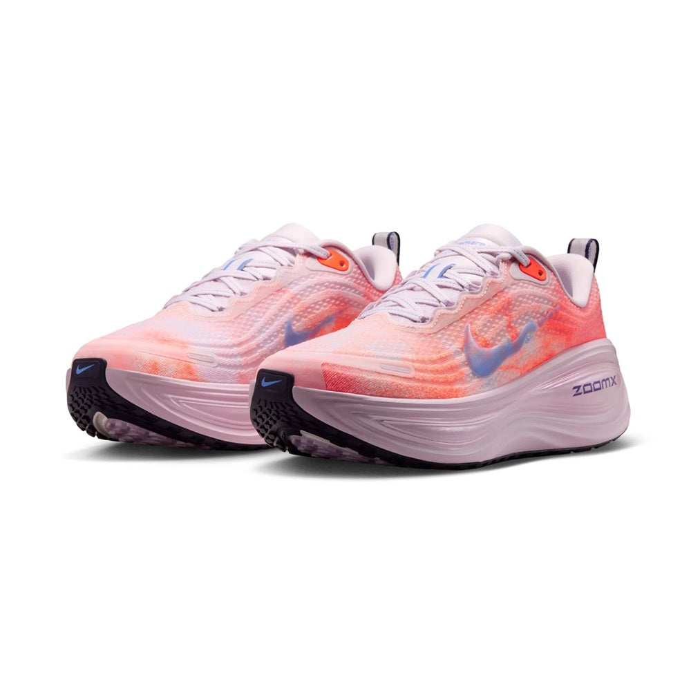 Women's Nike Vomero Plus running shoe pair view, orange-lilac knit upper with Nike swoosh.