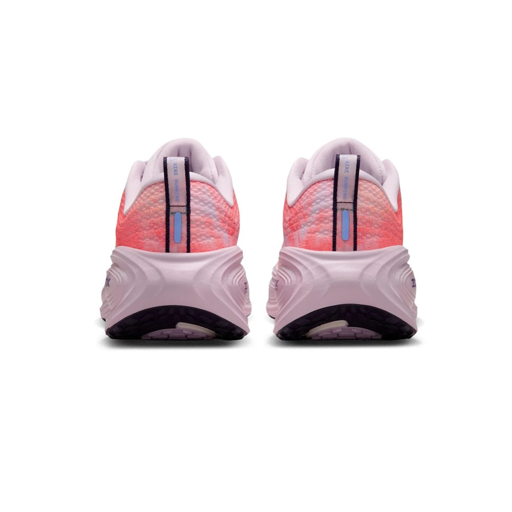 Women's Nike Vomero Plus running shoe heel view, lilac-orange with cushioned rear panels.