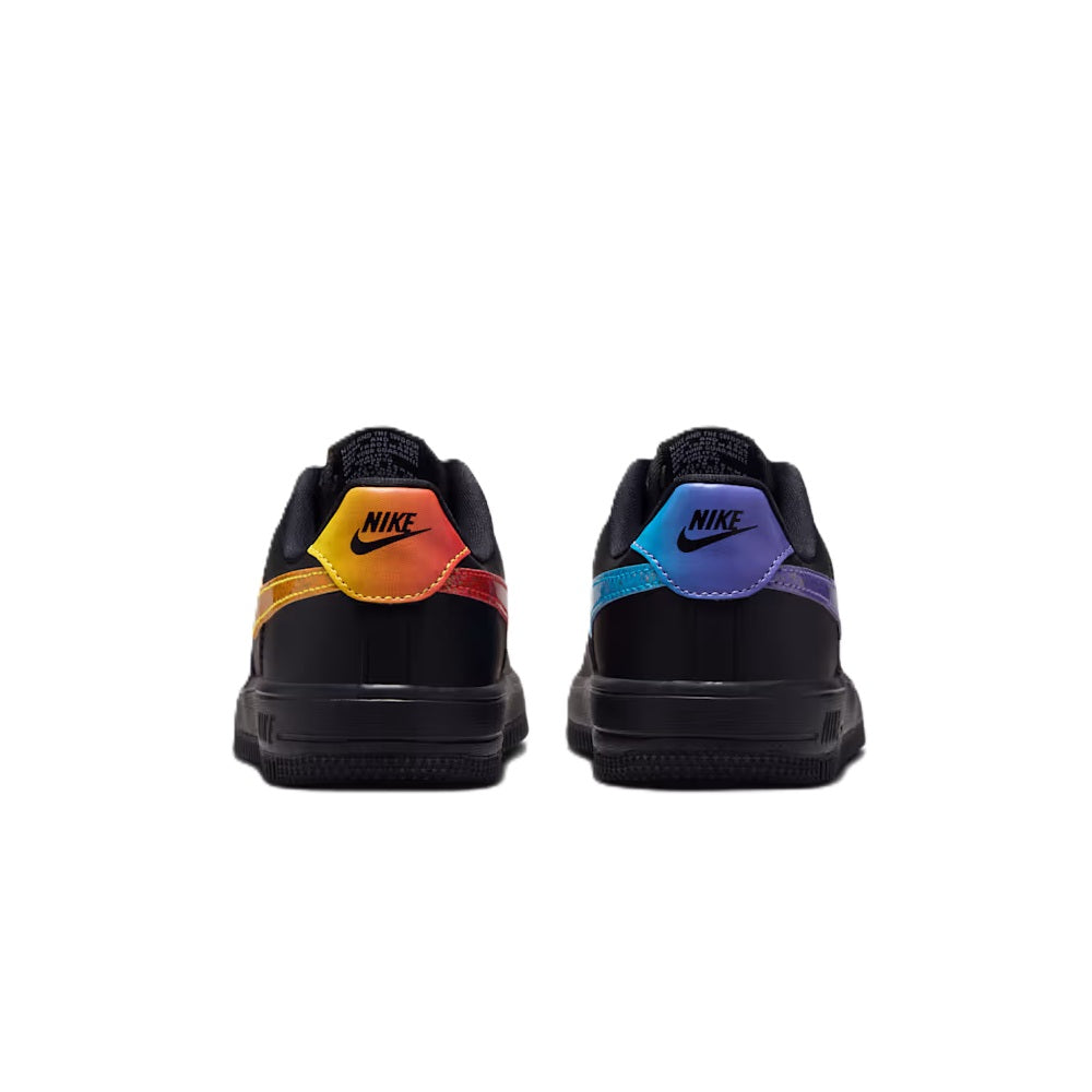 Kids' black sneakers, rear view with Nike branding in orange and purple panels
