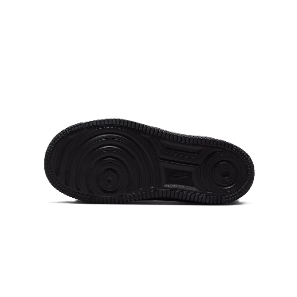 Kids' black sneaker outsole with textured rubber tread