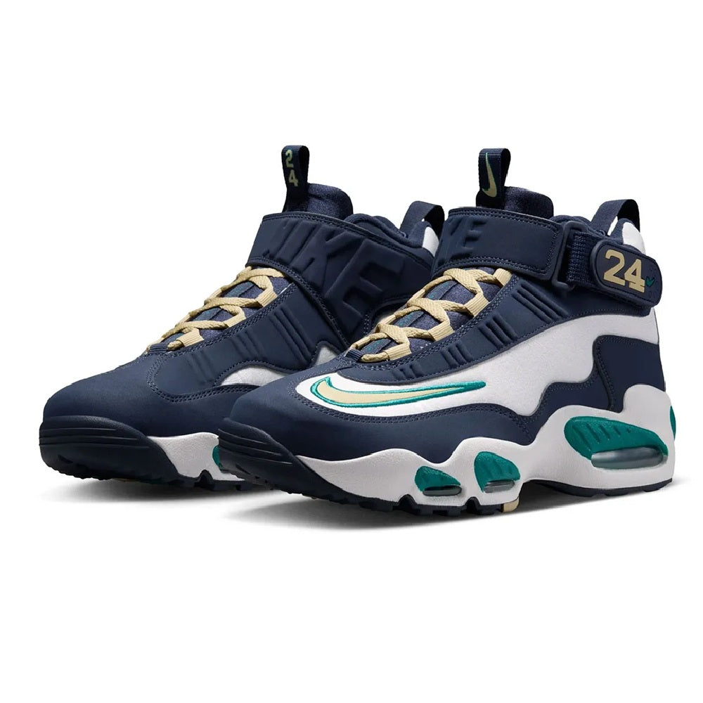Navy and white high-top sneakers with gold laces, teal stripes, and Air sole