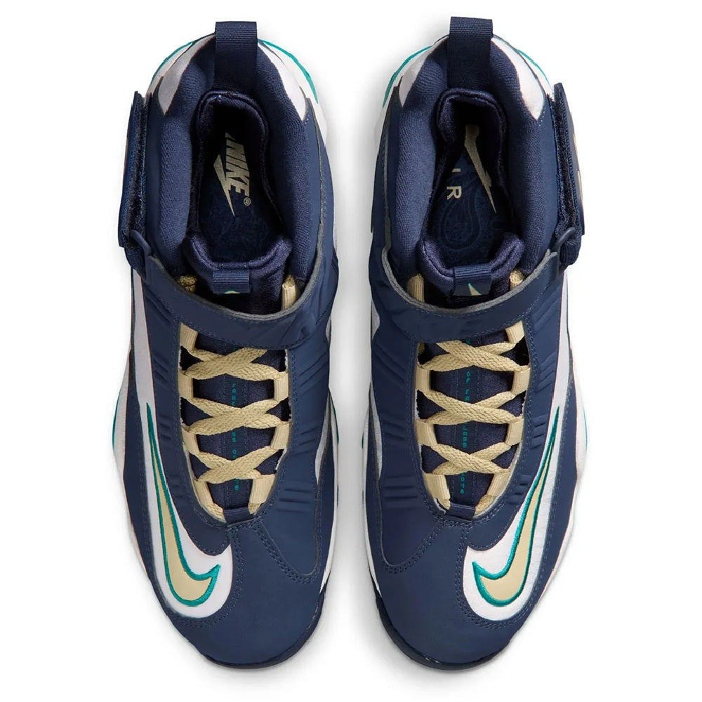 Lace-up sneakers with navy uppers, gold laces, and Nike heel branding in navy