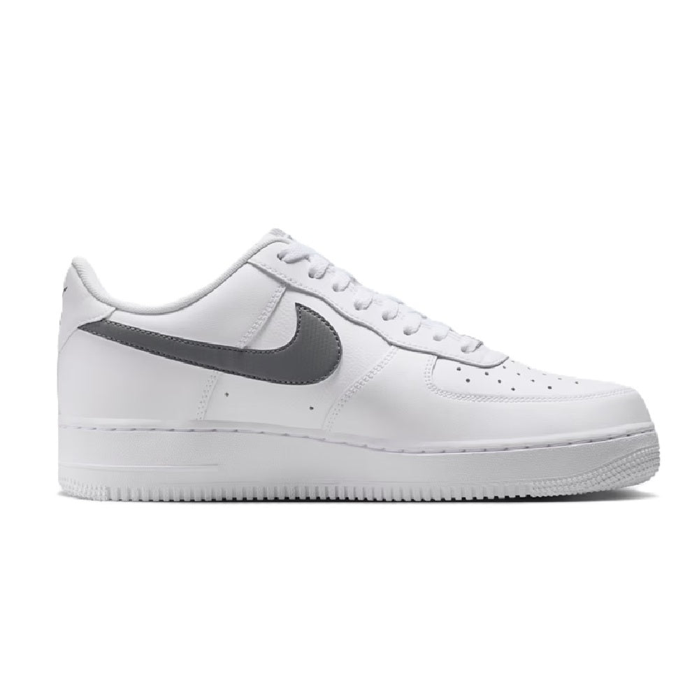 Nike Air Force 1 sneakers, white leather with dark gray swoosh, lace-up.