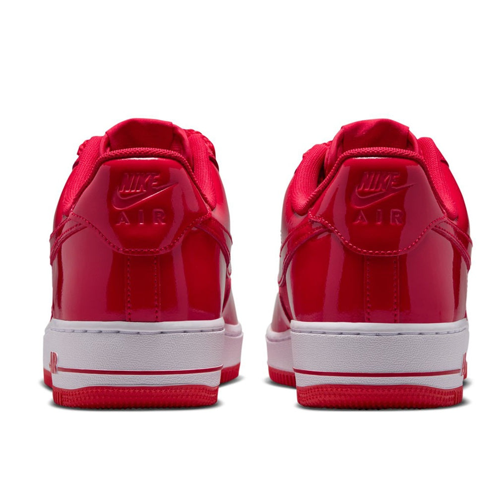 Red Nike Air Force 1 heel view, lace-up sneakers with Nike Air logo, white midsole