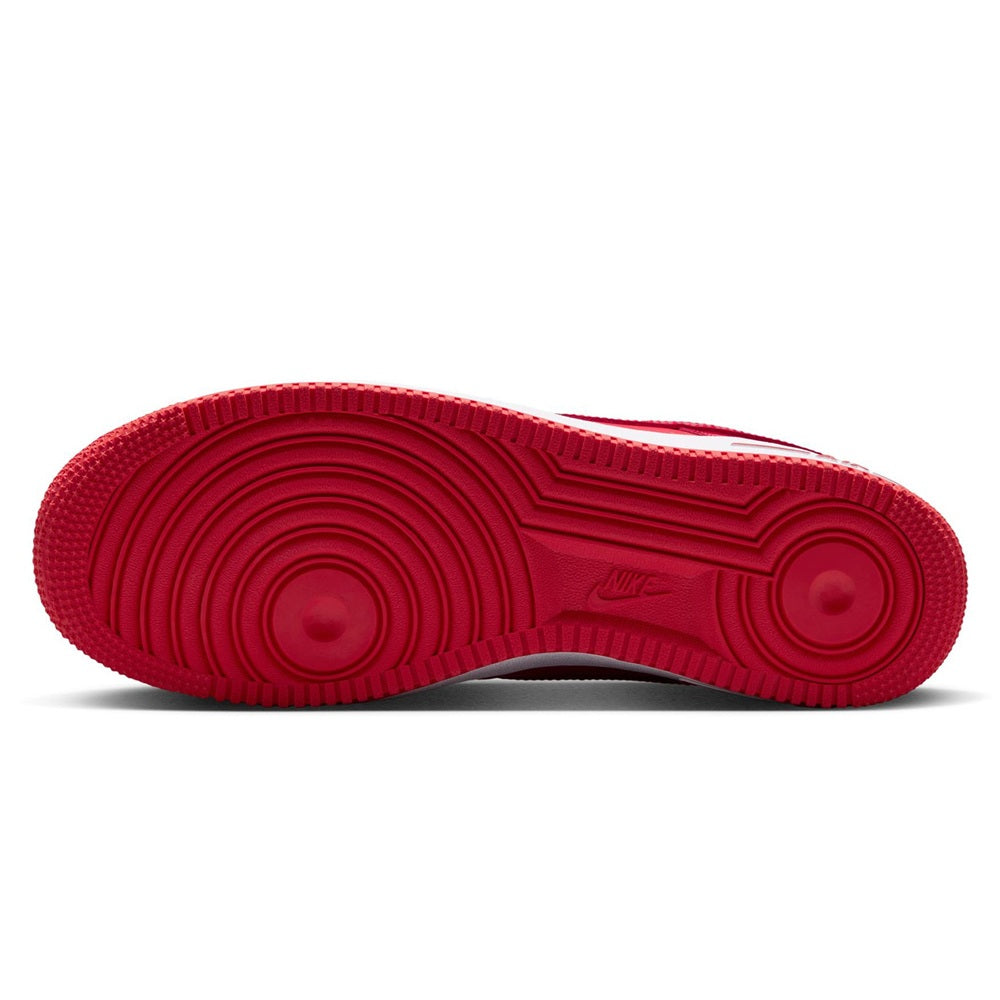 Red Nike Air Force 1 rubber outsole with circular tread pattern and traction grooves