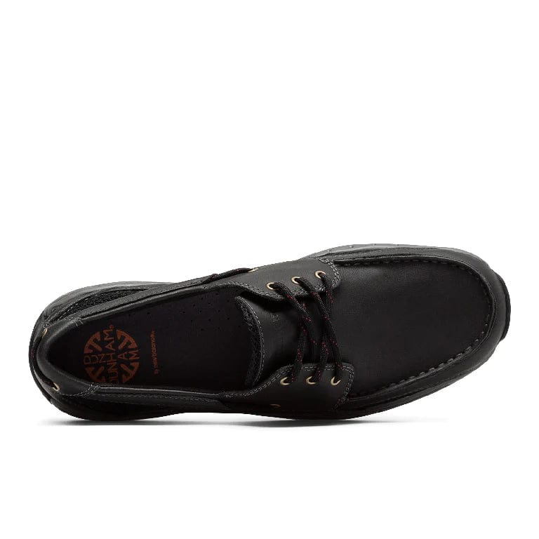 Black lace-up boat shoe with padded collar, perforated panels, and rubber outsole