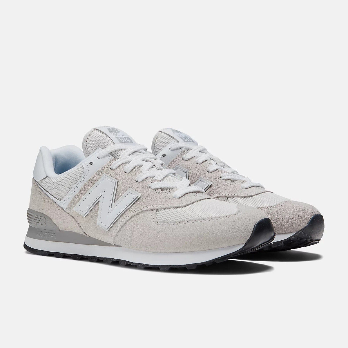 Pair of light grey and beige lace-up sneakers with white N logo and dark heel