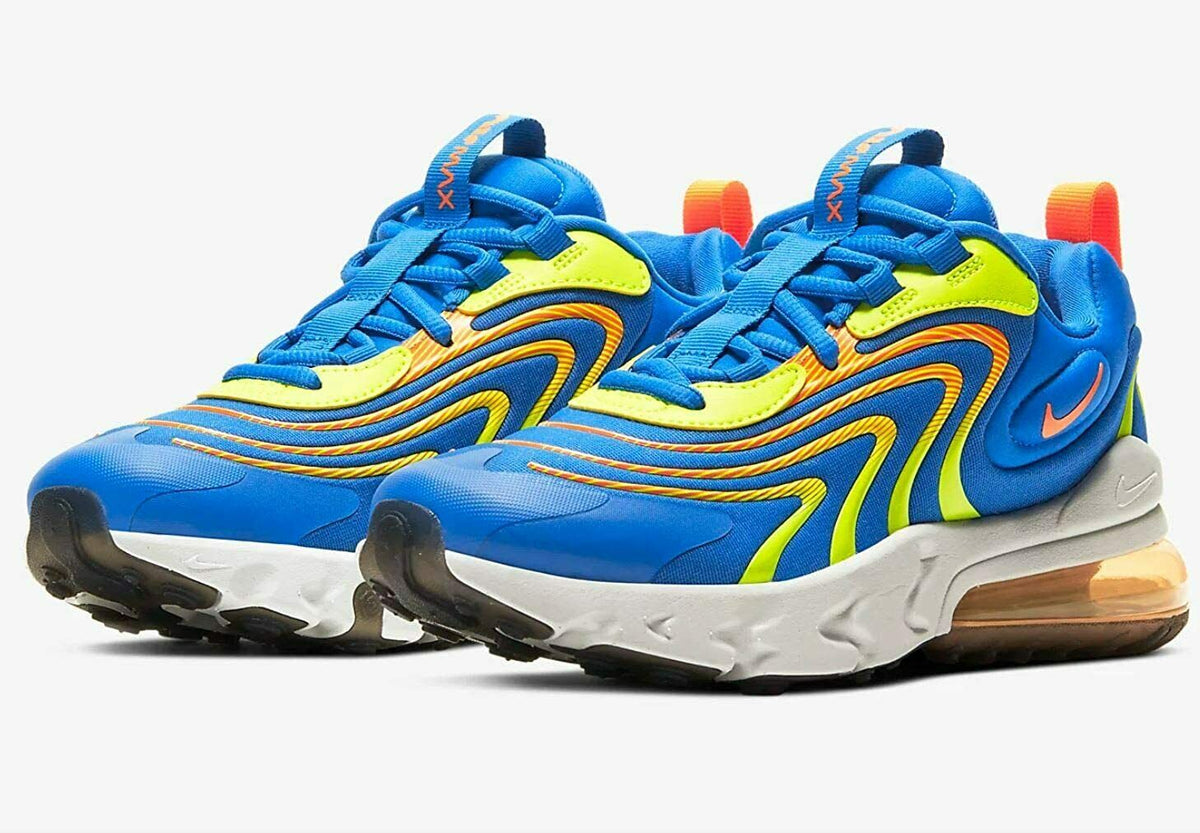 Nike sneakers, blue lace-up with lime stripes, wavy orange lines, and visible air unit