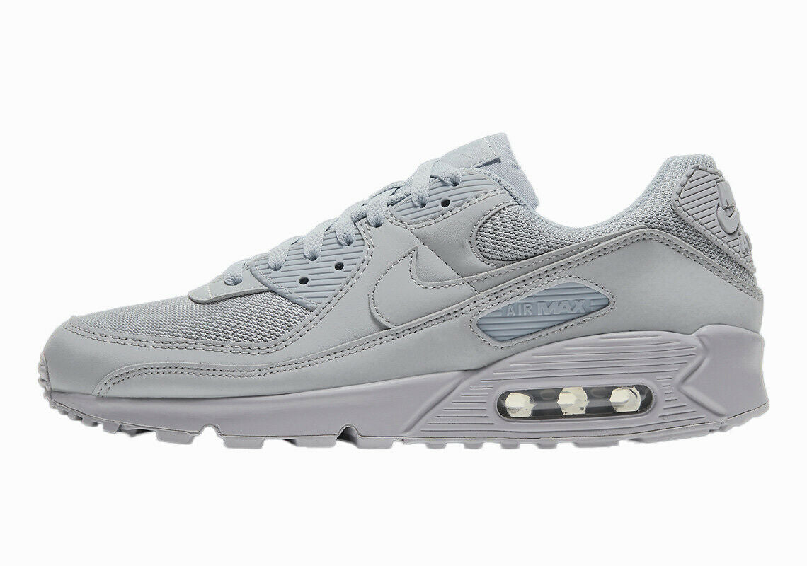 Air Max 90 sneakers in light grey with lace-up front and visible Air window sole