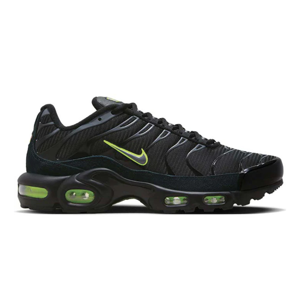 Nike TN Air Max Plus athletic sneaker in black with neon green accents